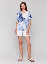 Charlie B Spring/Summer 2025-C1335TPK-P062-Printed V Neck S/S Top W/Twisted Front-Ink - The Coach Pyramids