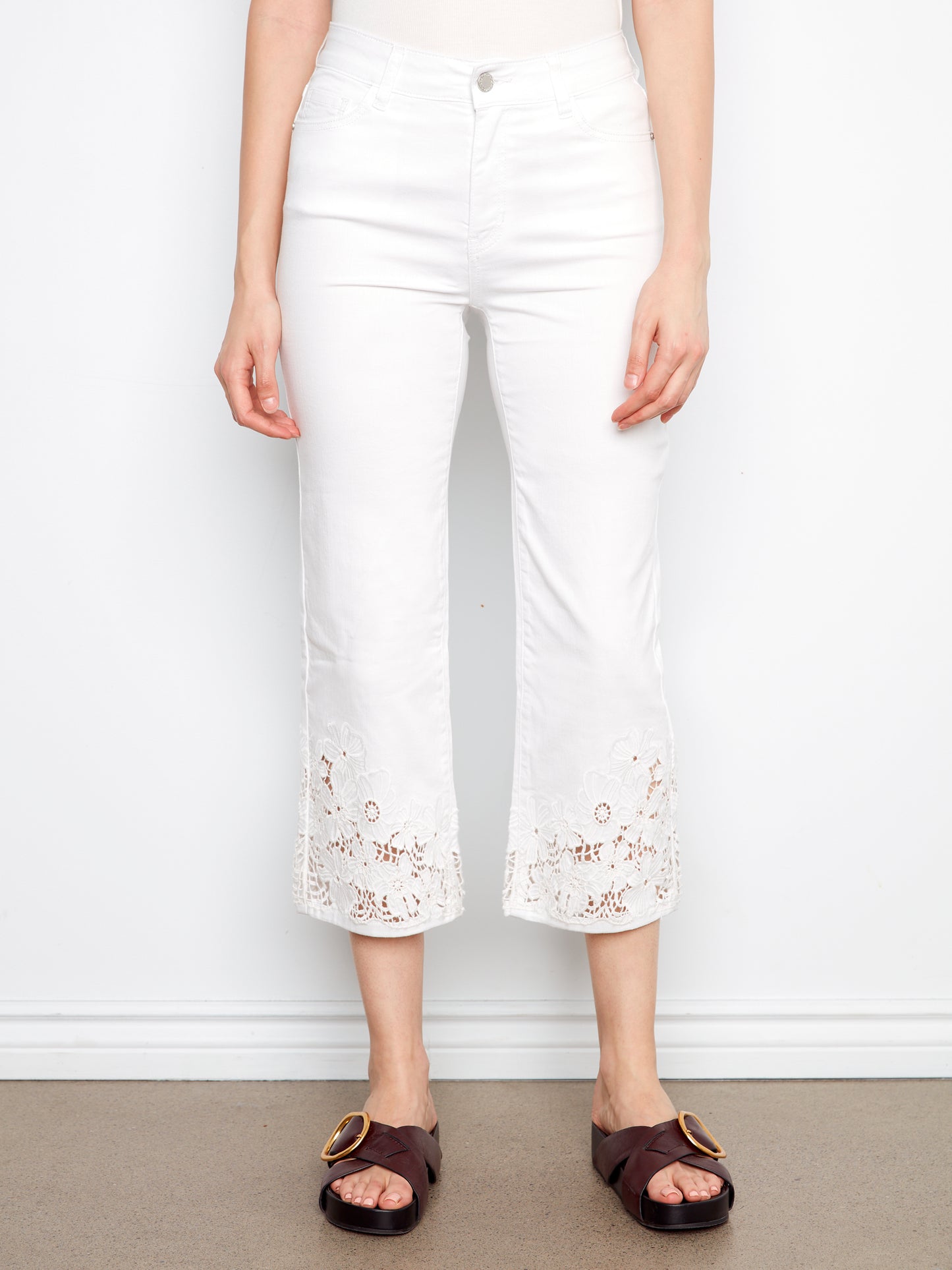 Charlie B-C5786-002-Cropped Flare Leg Jeans W/Laser Cut Lace Hem-White - The Coach Pyramids